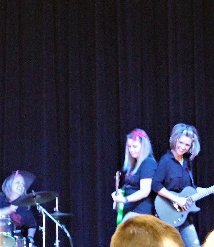 Look kids! Mrs. Fitzpatrick really DOES play electric guitar in a band!!