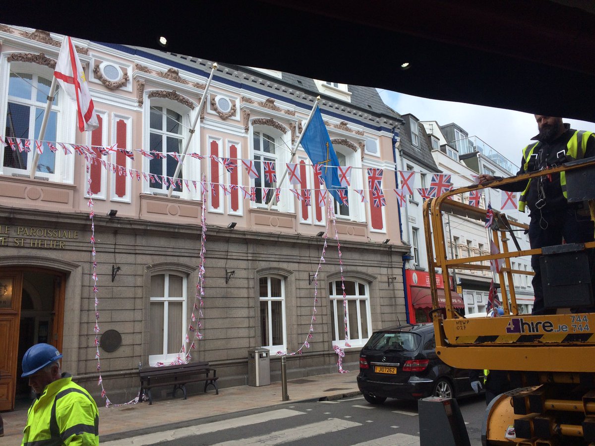 The #LiberationDay bunting is going up in St Helier. One week to go.