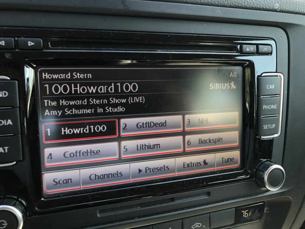 Car radio display of Howard Stern featuring guest Amy Schumer on Sirius satellite radio. 