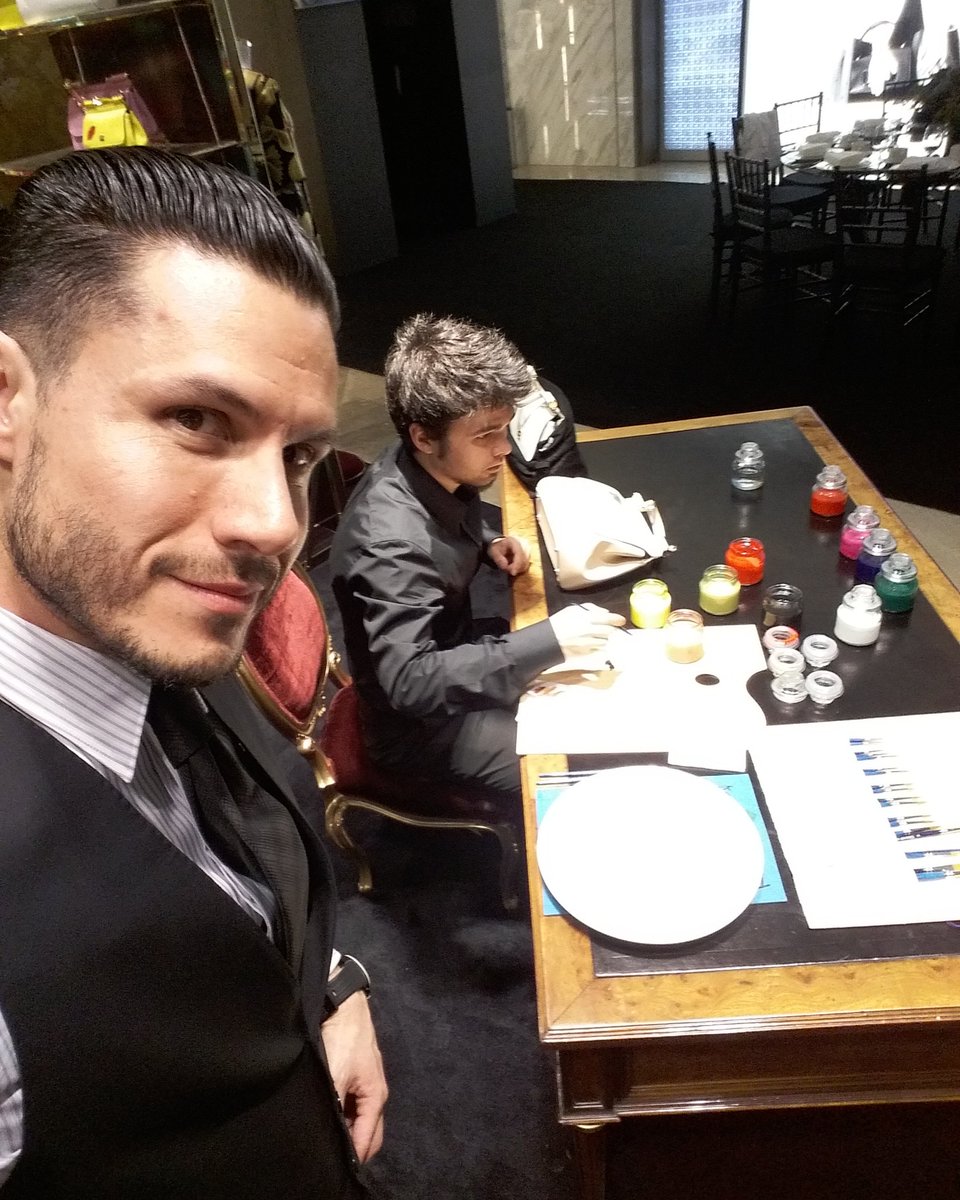 Lozancar's tweet photo. Italian artisan painting custom handcrafted Sicily Bags for today's event. @dolcegabbana #dg #dolcegabbana #artist #art #custom #oneofakind https://t.co/fieeMmITUM