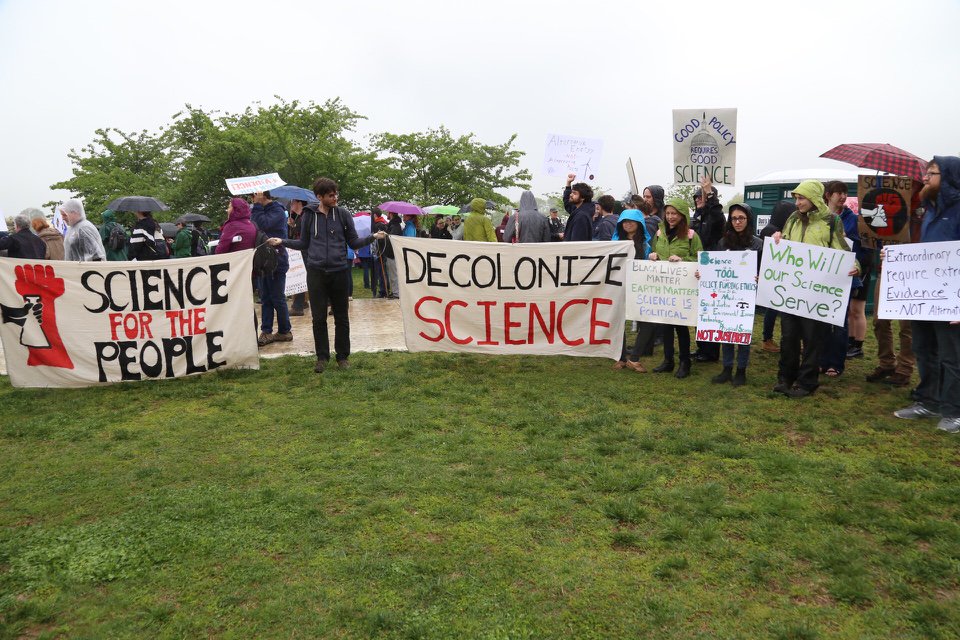 Gizmodo's tweet photo. .@ScienceMarchDC @ScienceMarchBER @MarsZaZnanost @ScienceMarchTUE @douglasfinch "What do Trump and atoms have in common? They make up everything!"
These scientists have jokes. #MarchForScience #EarthDay https://t.co/GAIFjrIjRA