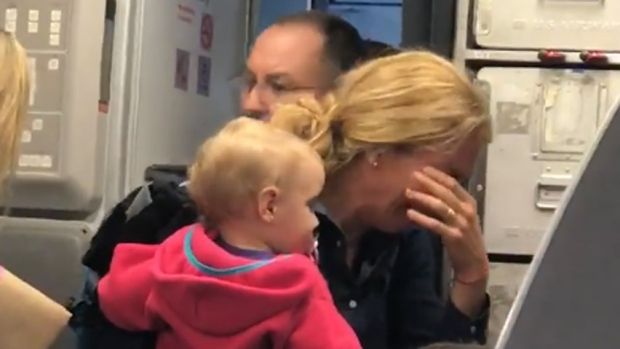 CBCNews's tweet photo. American Airlines worker challenges passenger to 'hit me' in fight over stroller https://t.co/632yOJKAwe https://t.co/2slAgV7aNZ