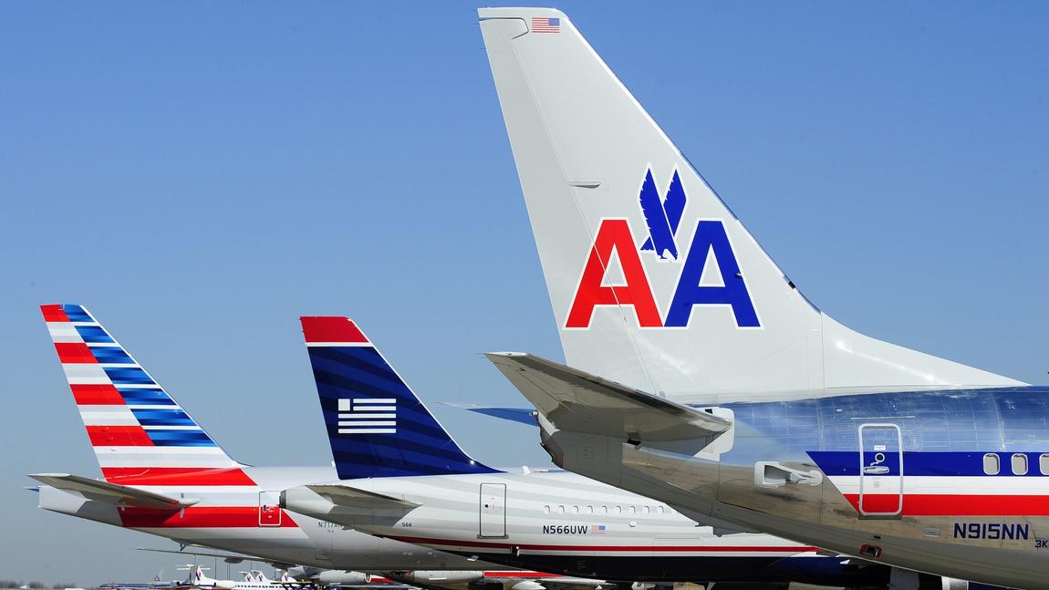 latimes's tweet image. American Airlines flight attendant tells angry passenger: “Hit me. Bring it on” lat.ms/2p76WPV