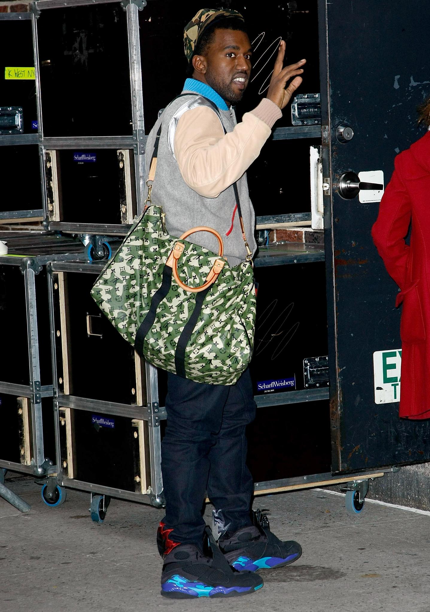 Green Label on X: #NeverForget When Kanye West wore Aqua 8 Jordans with  Patelle, the camo Louis Vuitton bag, and a BAPE x KAWS hat. Ah, memories.  via Getty  / X