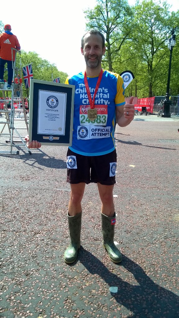 3:21 new <a href="/GWR/">Guinness World Records</a> for fastest #marathon wearing #WellingtonBoots. Raising £ for <a href="/SheffChildrens/">Sheffield Children's</a> virginmoneygiving.com/LondonInWellies