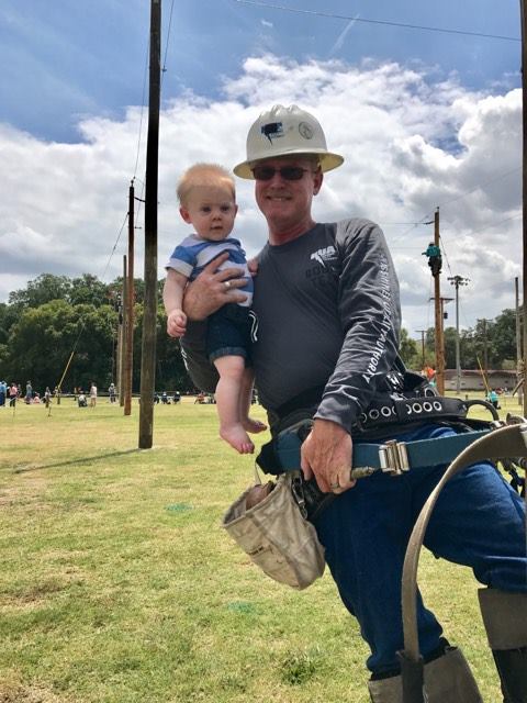 KUAdirect's tweet image. The only thing KUA&apos;s Bruce Thompson loves more than being a #lineman is being a grandpa! #futurelineworkers #PublicPower #ThankALineman