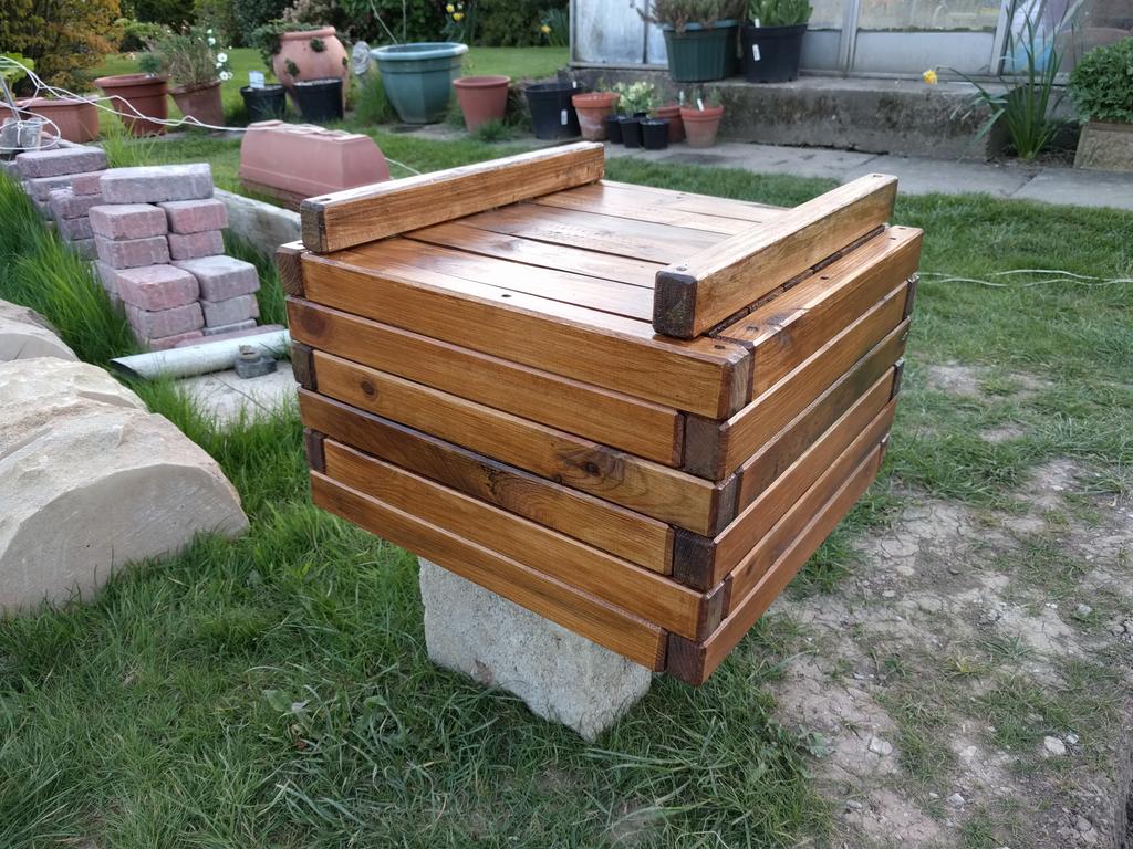 Varnishing up the planters for the new season