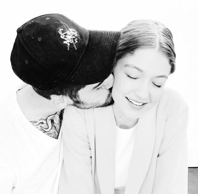 . - Zayn wished Gigi a happy birthday with a big ol\ smooch! 
 
