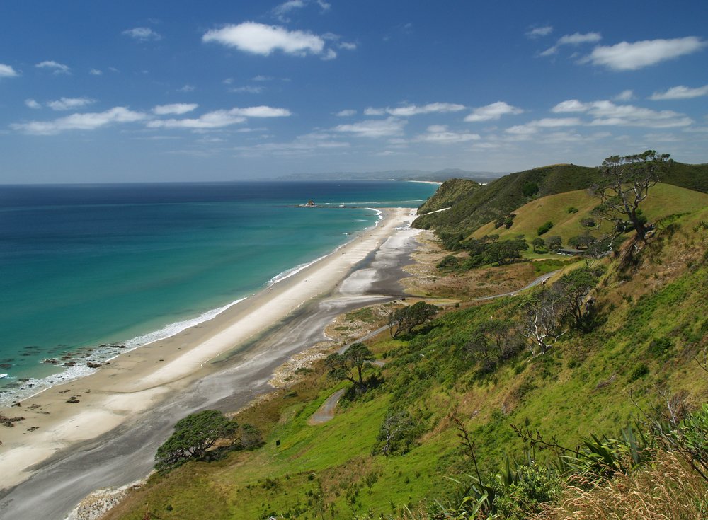 Win return flights for 2 with <a href="/qatarairways/">Qatar Airways</a> to Australia or New Zealand. This is Mangawhai Beach, Auckland. Follow &amp; RT to enter #DUBQatar