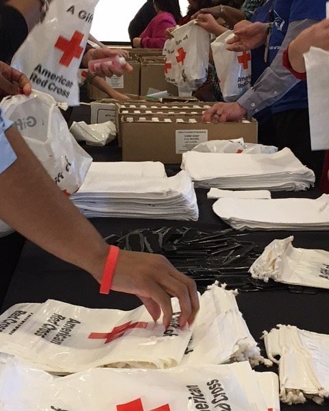 LmarieAsad's tweet photo. Celebrating #NationalVolunteerWeek w/ my Sorority Sister @BCBSIL making kits for #veterans. #DeltaSigmaTheta #Iserve #DST1913 #BlueCorpIL 🔺 https://t.co/x11rWhKBad