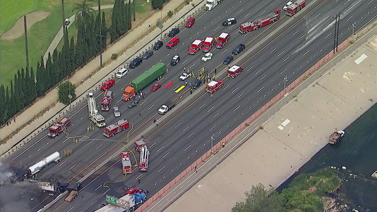 ABC7's tweet photo. PHOTOS: Crews respond to fiery multi-vehicle crash on 5 Freeway https://t.co/wUBuFzPK7g https://t.co/qI64BdmU2O