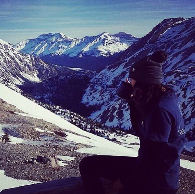 Kieren Of <a href="/theladyalliance/">The Lady Alliance</a> enjoying some hot chocolate on a well deserved summit! #ExploreAlberta #GetOutside #TheSweetLife #adventure