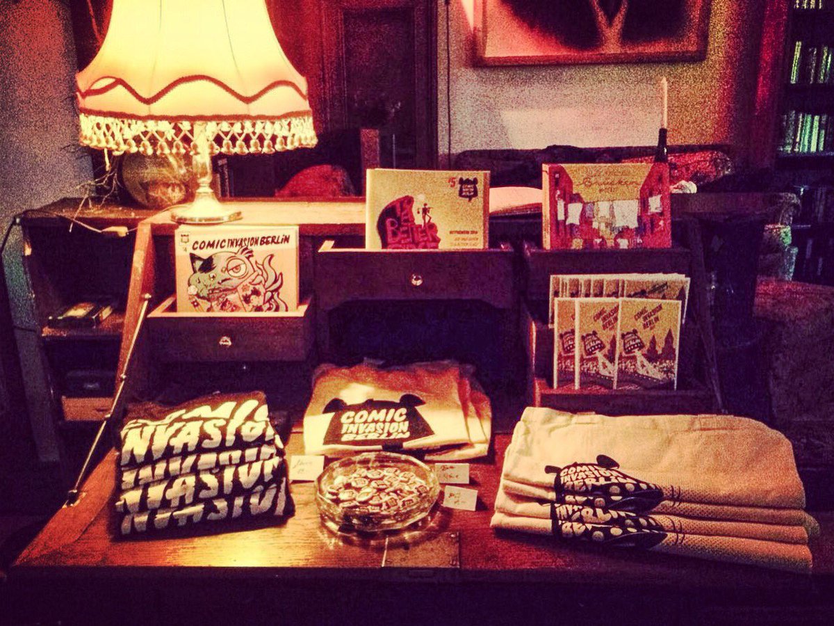 comicinvasionb's tweet photo. look at that cute #CIB17 info/merch table at Villa Neukölln! 
Please support the festival at the SATs + grab a contest book or a shirt ^_^ https://t.co/mteH0jyoek