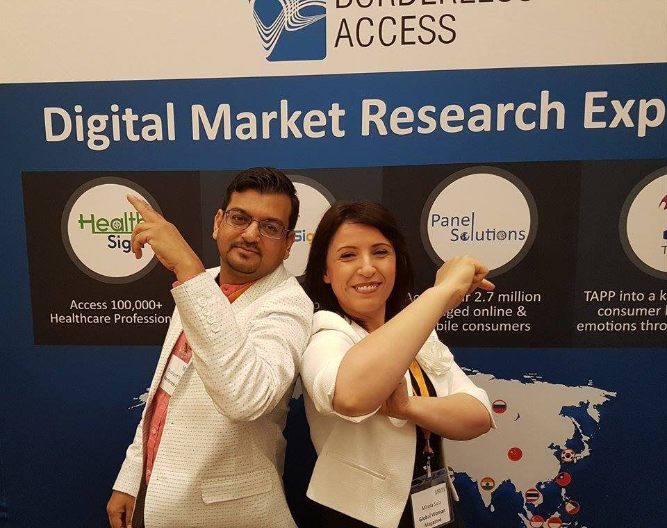 GlobalWomanCo's tweet photo. Our Editor in Chief @sulamirela showing Dushyant Gupta @borderlessXs how strong women are.What a great experience at #MWWM today in Chicago https://t.co/7N3Y98brdA