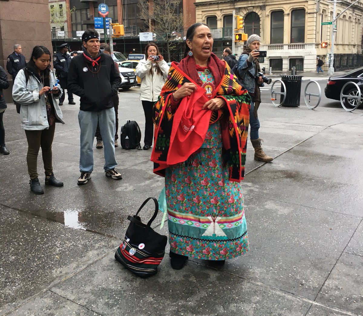 OccupyWallStNYC's tweet photo. Citibank Chairman admitted company wishes it had "a do-over" on Dakota Access project after native dancers disrupt shareholders meeting. https://t.co/lT29dQcyqH