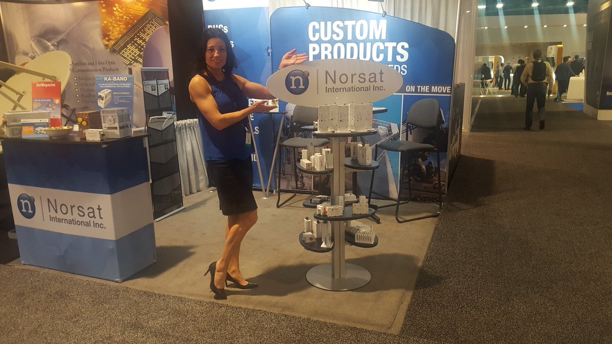 Norsat's tweet photo. The Price is Right Beauties have nothing on this Marketing Manager showcasing Norsat LNBs! @NABShow #microwavecomponents #receivers https://t.co/LTffrF2gqb