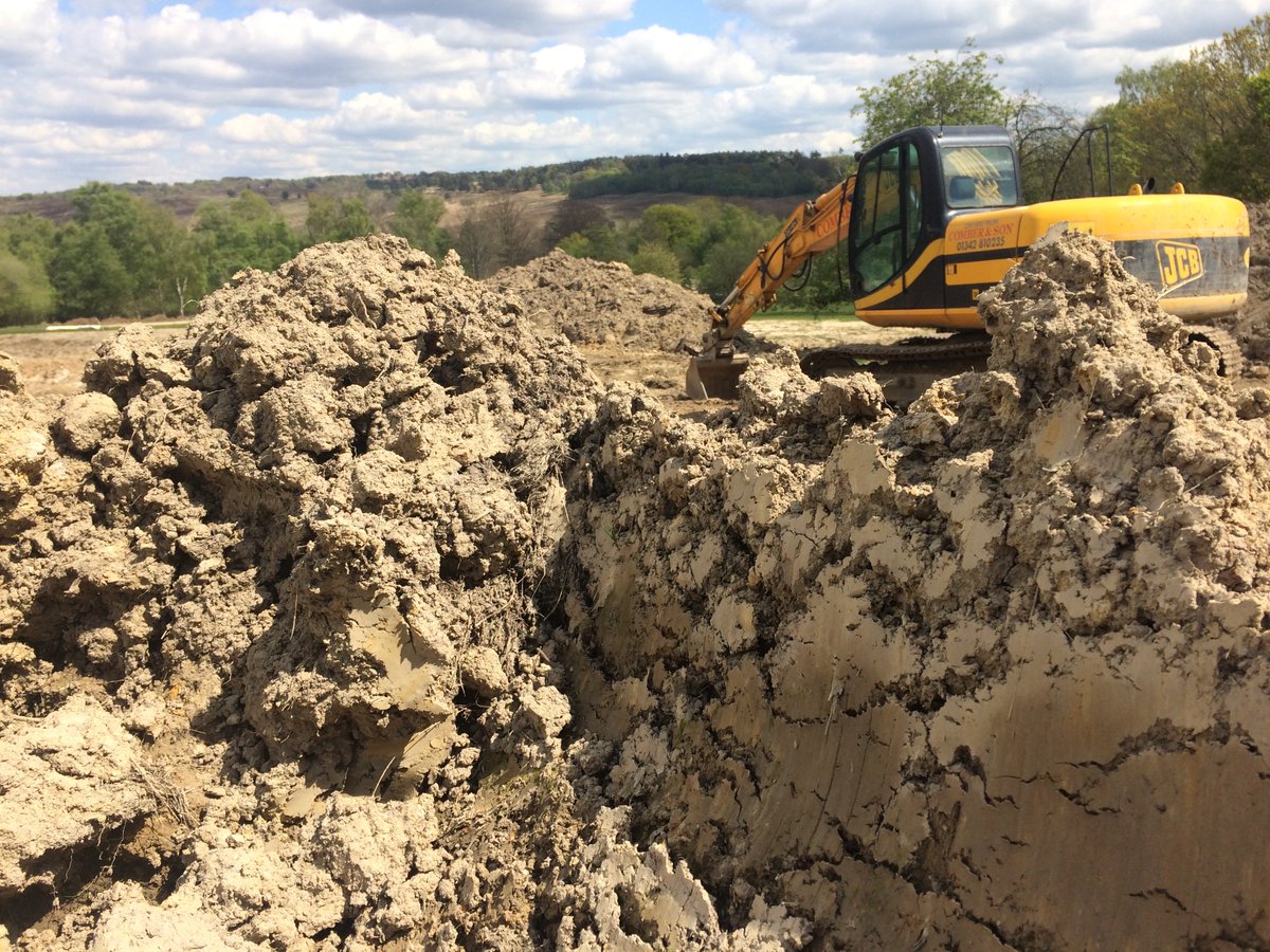 RustyExcavator's tweet image. Overwhelmed by sudden melancholy, this excavator stops digging and contemplates the horizon. What is the point of all this earthmoving?