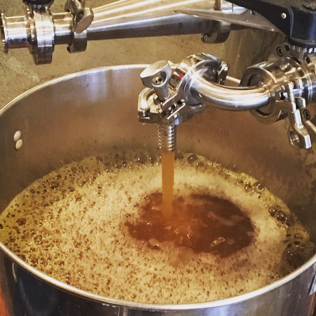 The highlight of a brew day: watching our petite saison transfer from the kettle. Happy fermenting, little buddy! #ohiocraftbeer
