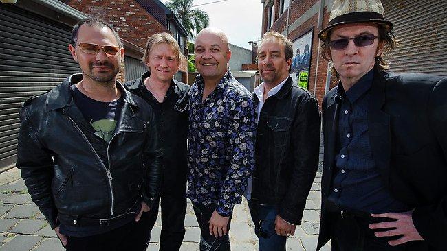 Test your Aussie music knowledge. Who's in this pic with Michael?