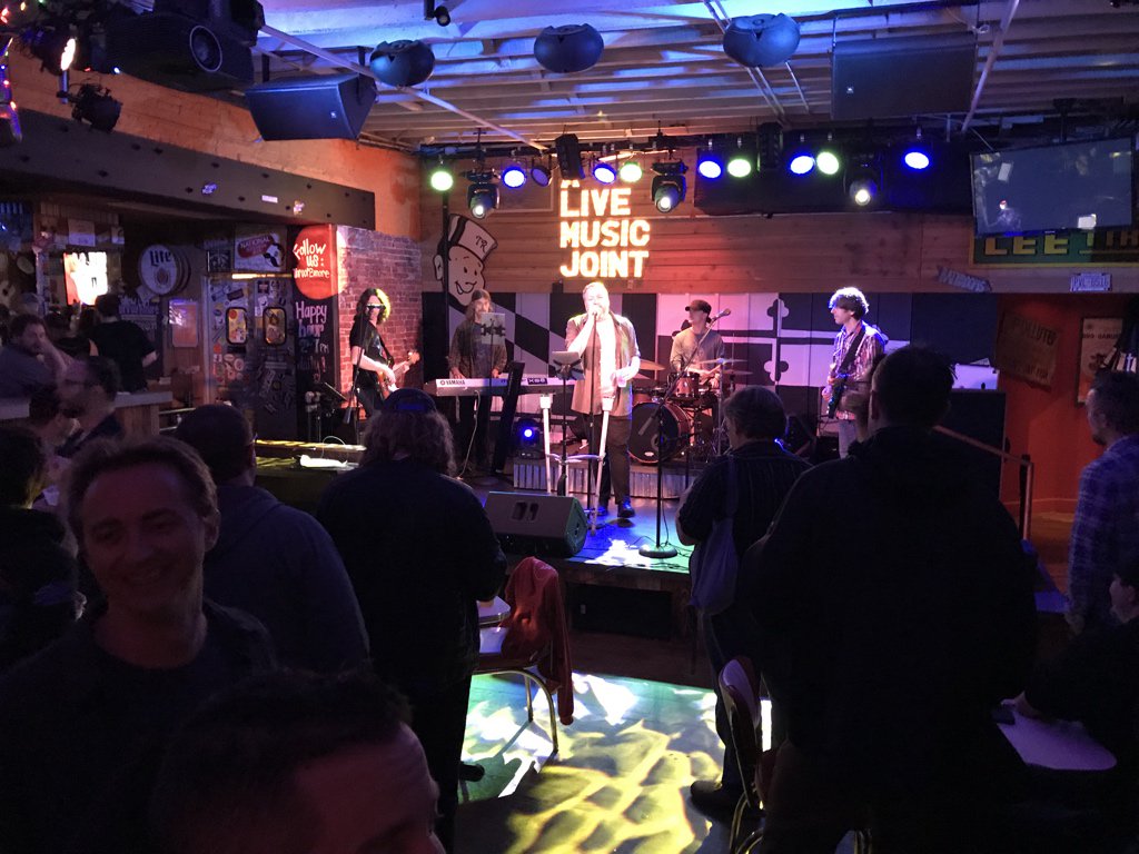 ajschwab's tweet photo. The one and only @McDwayne opening up @DrupalKaraoke at @TinRoofBMore #DruaplCon https://t.co/04uP1OU36A