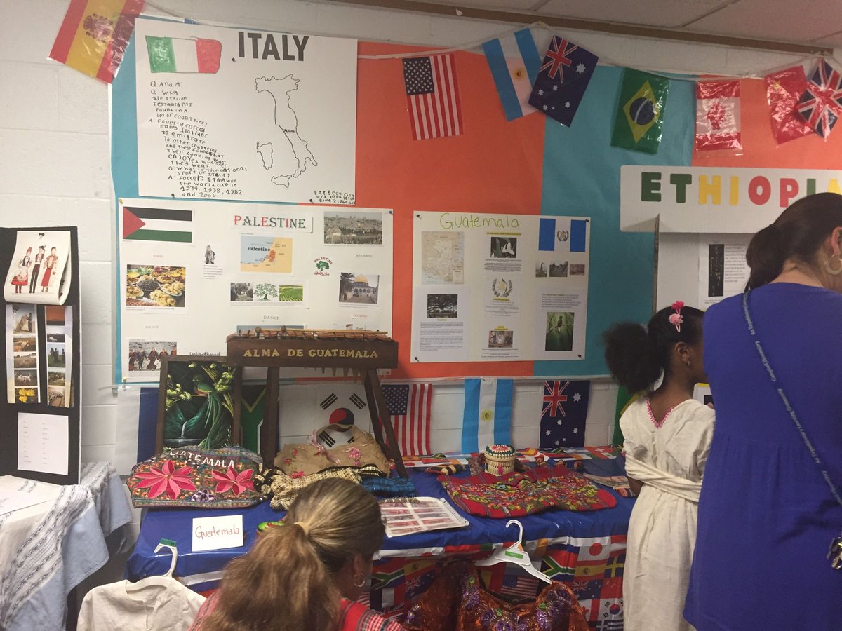 CounselorMissB's tweet photo. Student posters,dancing and eating together. Yum! Love learning about and from my families :) #whoisteachingwho #ilovemyjob https://t.co/crtbomUoKl