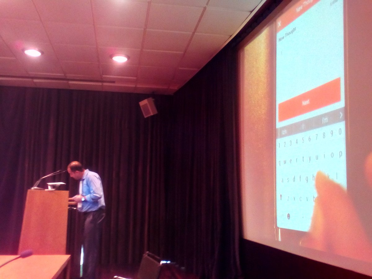 A presenter and a video of the face of a mobile phone