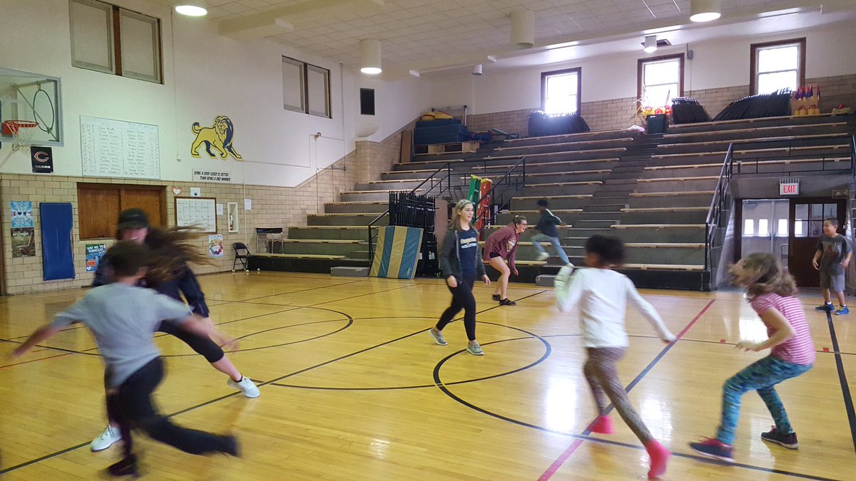 daveknuckey's tweet photo. #thishouserocks.         Augie VB players volunteering in Mr. Terronez's PE @ Longfellow class. They are playing tag. Awesome!! https://t.co/9SzuUjZJ7w