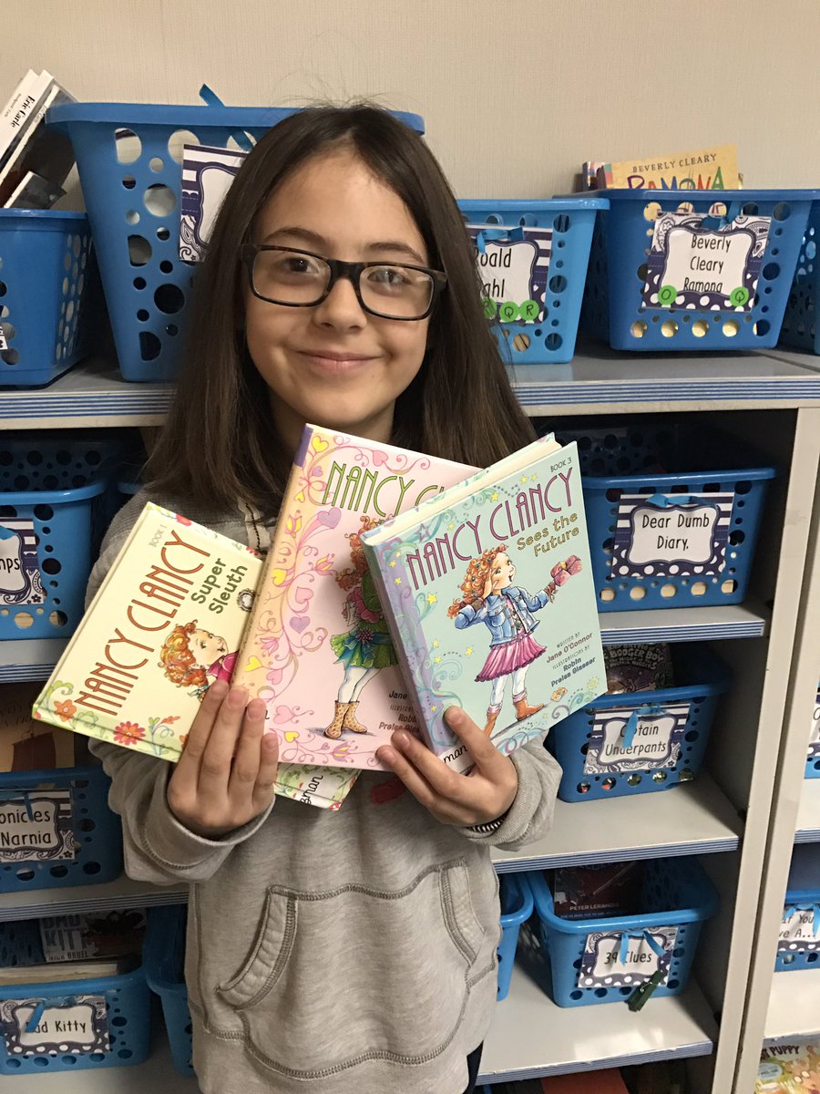 salzmanclass's tweet photo. This girl just found her new favorite series! #nancyclancy read so much she forgot to play on her phone ๐ฑ #wearewayne @MWEwayne #fashionista https://t.co/V5h9GEf0U7