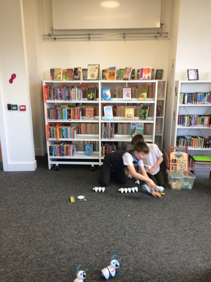 InverclydeLibs's tweet image. Week 2 of #Invercoders code club: Using logic to program #codeapillar to navigate round an obstacle course, learning lots! @SLIC1991
