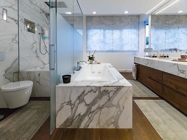 designcommerce's tweet image. We love the mixture of finishes in this bathroom in the House ML + M + R by Caprioglio Associati Architects. #designcommerce