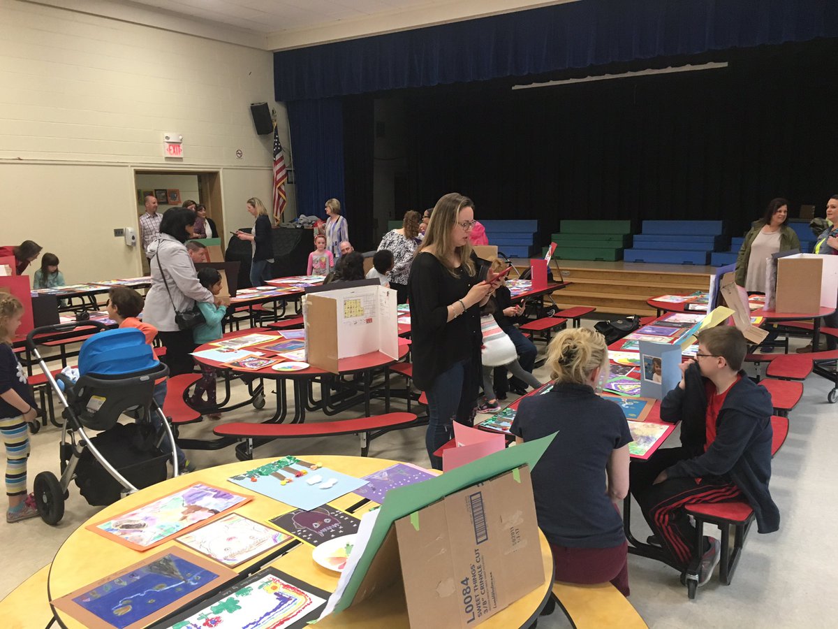 WOSnews's tweet image. WOS artists in #mrssheehyWOS&apos; class proudly exhibit and discuss their artwork during this morning&apos;s art show.