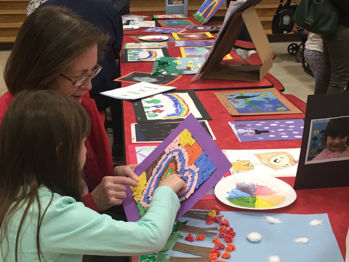 WOSnews's tweet image. WOS artists in #mrssheehyWOS&apos; class proudly exhibit and discuss their artwork during this morning&apos;s art show.