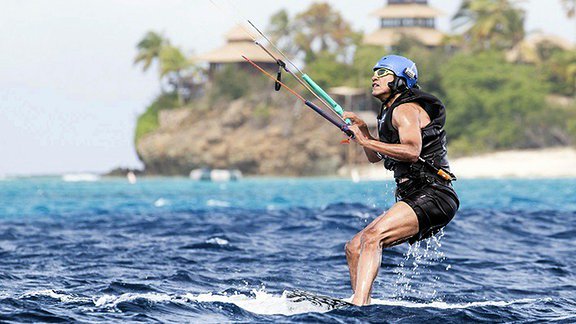 Here's a pic of Obama kitesurfing across the tears you shed over his $400,000 fee for giving a speech