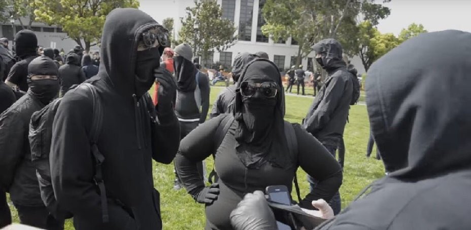 Antifa pussies hide faces calls disabled veteran coward