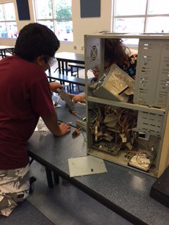 LehighElem's tweet image. Students and parents did some reverse engineering after school. Thank you high school student volunteers for your help! #loveleeschools