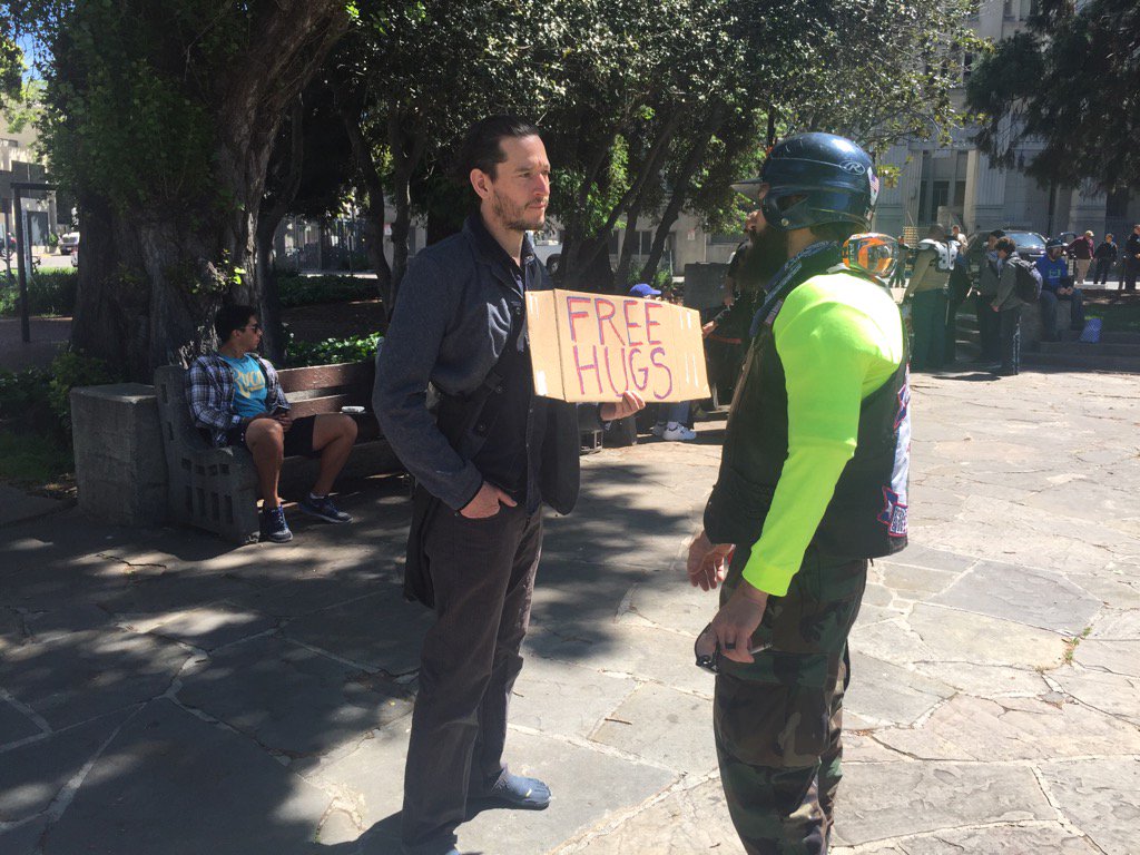 There are peaceful conversations happening too at Civic Center Park in Berkeley. Free hugs too