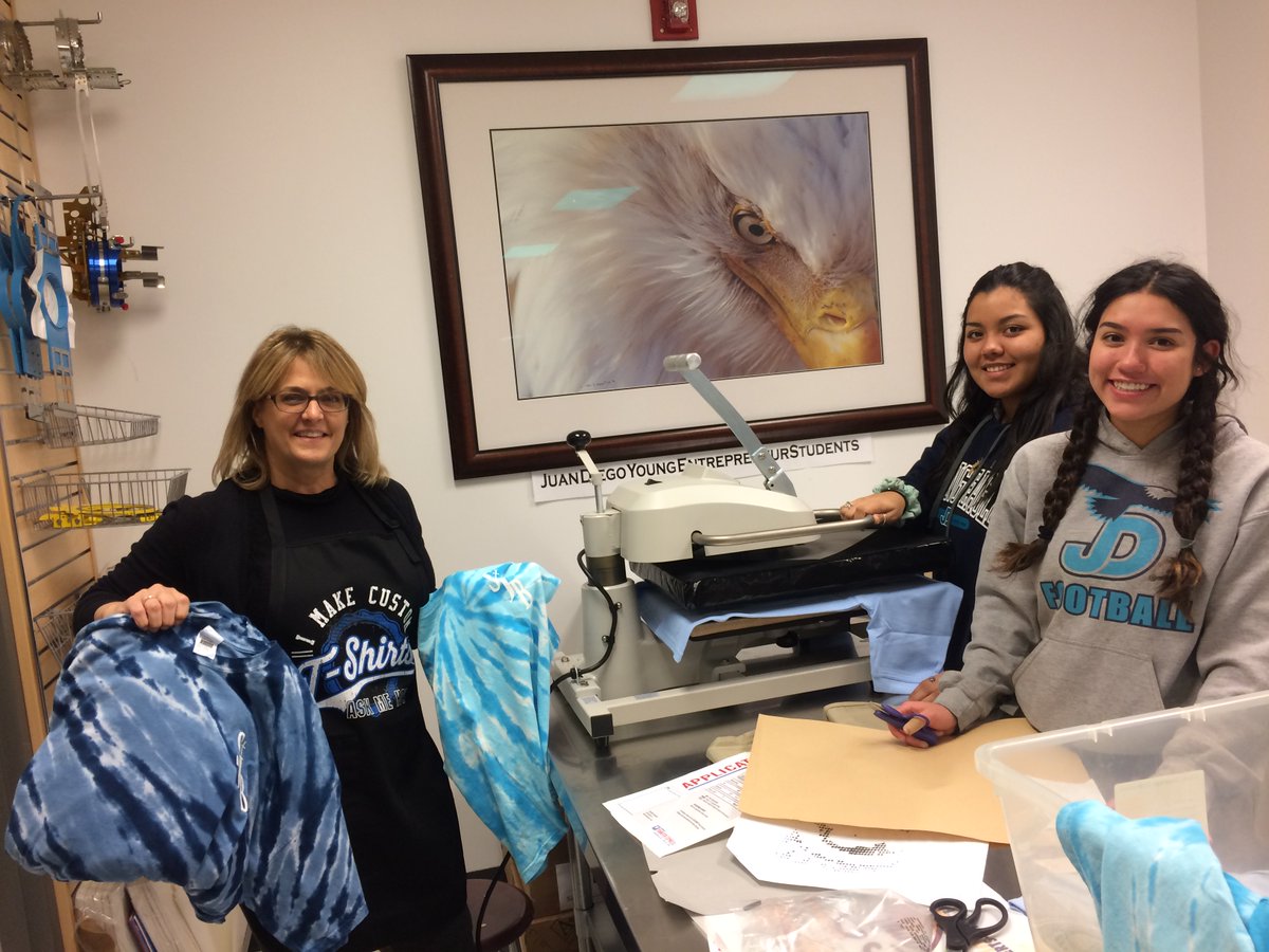 All smiles while testing new equipment for JDYES - Spirit Shop! <a href="/JDStudentLife/">JDCHS STUDENTS</a> <a href="/JDGives/">JDCHS Advancement</a>