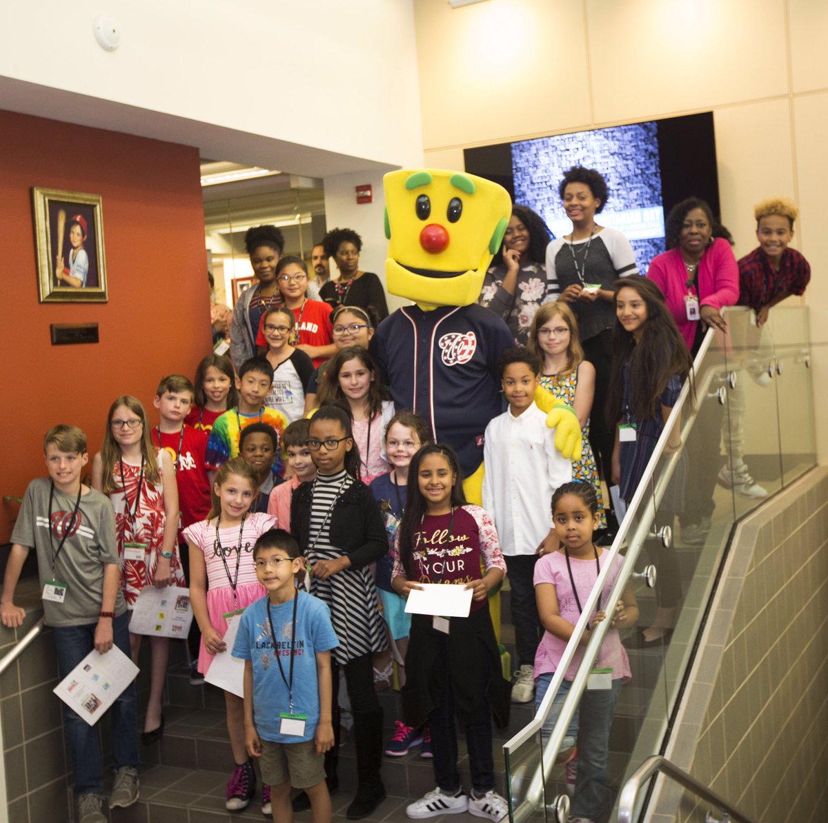 NCMEC's tweet image. Clicky, the @NetSmartz #internetsafety robot makes a special appearance with the kids for NCMEC's #takeyourchildtoworkday