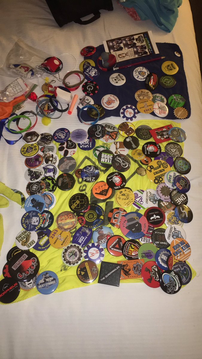 tigerbots2509's tweet photo. One of our students laid out all their merch!! 😮#FIRSTChamp #buttonseverywhere https://t.co/gjjPVWNPYN