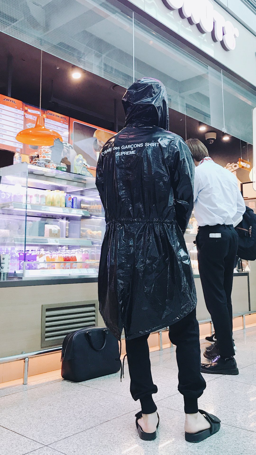 Plastic bag coat shop