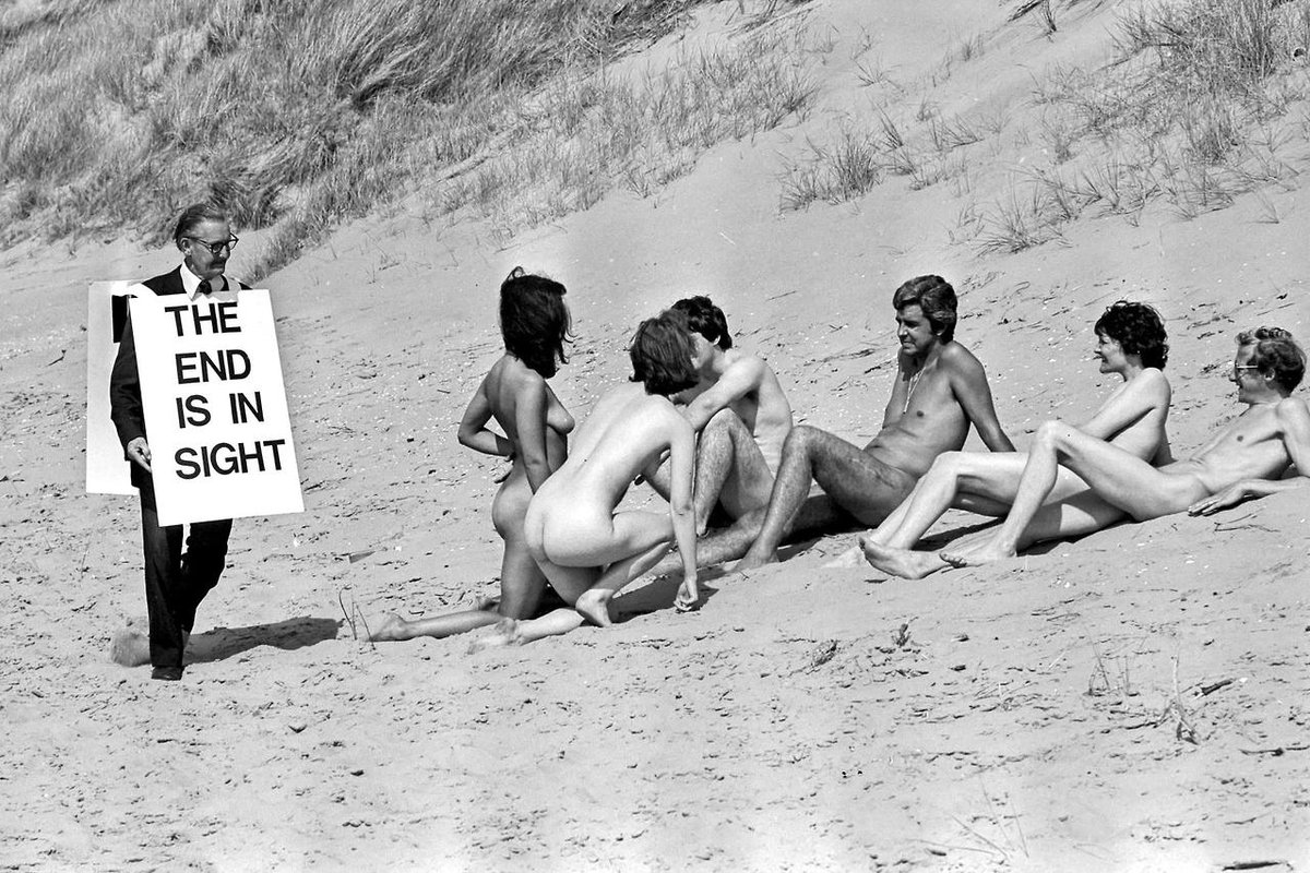 Preacher on a nudist beach in England, 1974. mostlysignssomeportents.tumblr.com/post/160106088…