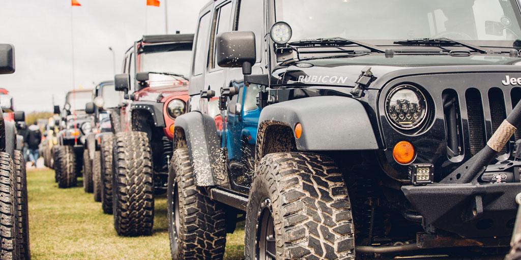 Jeep's tweet image. Always travel in packs: Nearly 700 Jeep® vehicles took on the Mackinac Bridge at Jeep the Mac.