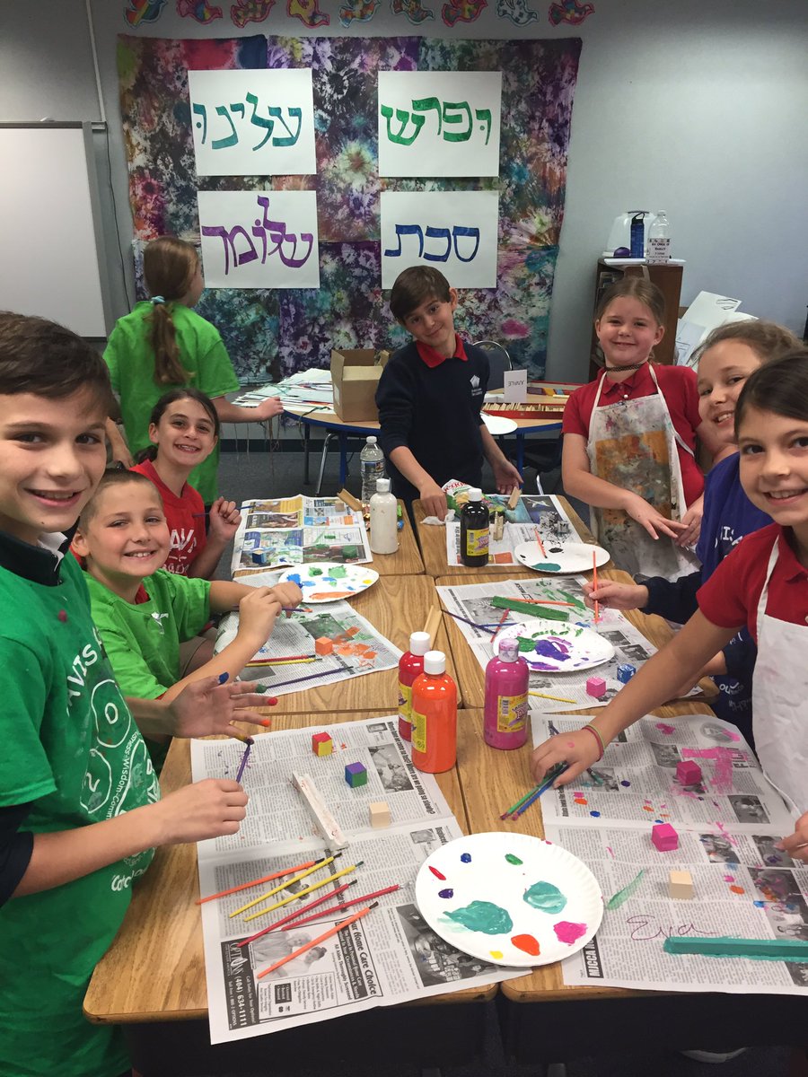 It's grey outside, but its colorful in here. Painting our Omer counters. #jewishmakerspace #omerblocks #davis4