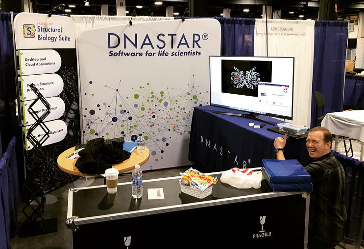 DNASTARInc's tweet image. Steve setting up booth 426 at #PEGS17. Make sure to stop by to hear about our new #StructuralBio offerings (&amp;amp; maybe snag some of that candy)