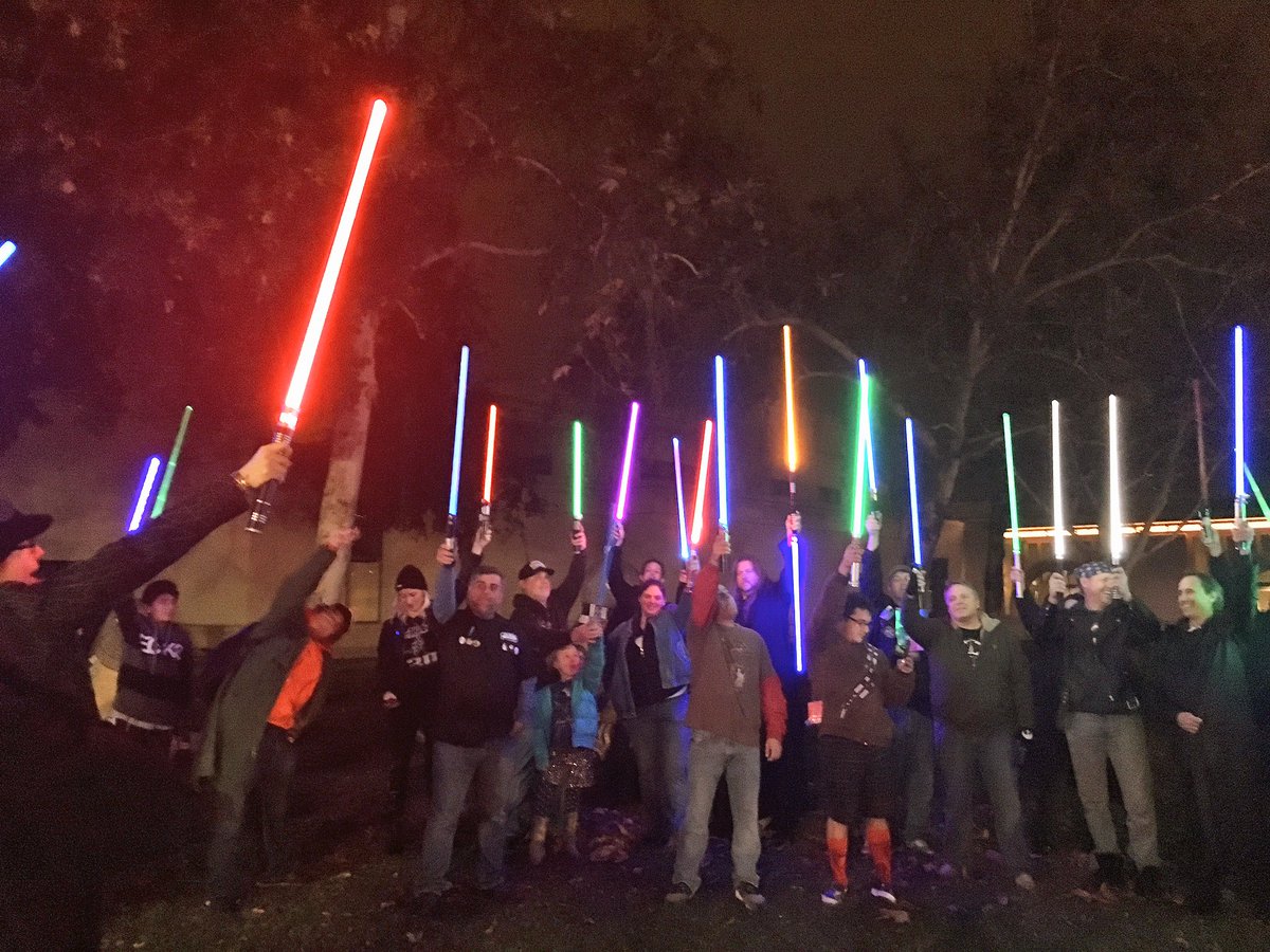 HopeNEWS8's tweet photo. With #lightsabers held high, dozens of #StarWars fans honored #CarrieFisher as #PrincesLeia with a #LightSaberVigil in #Escondido @CBS8 11pm https://t.co/tHvPXmabOE