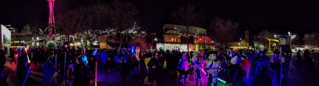 retroist's tweet photo. A panorama of the Carrie Fisher Lightsaber Vigil @seattlecenter #LightSaberVigil https://t.co/wMHb6rwJAt