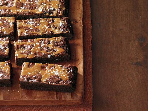 FoodNetwork's tweet photo. Ina's Salted Caramel Brownies aren't going to just bake themselves. More party picks: https://t.co/K0J5ficrZr. https://t.co/rJmMGpTHWB