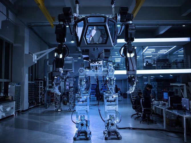 CNET's tweet image. One small step for man, one giant step for robot suit with man inside cnet.co/2ibolUd