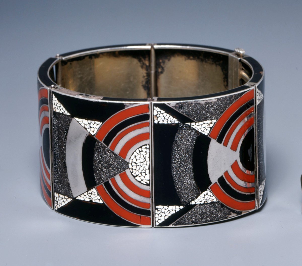 Jazz Age bracelet, France 1920s. Rhythm crystallized in lacquer <a href="/britishmuseum/">British Museum</a> bit.ly/2hAvsqr #jewellery #ArtDeco #DecArts #jewelry