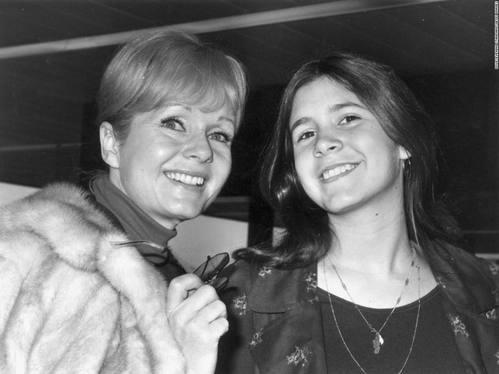 CNN's tweet photo. Did Carrie Fisher give her mom the courage to let go? https://t.co/mnMDGCbyVA via @CNNOpinion https://t.co/6tMXnmMQyM